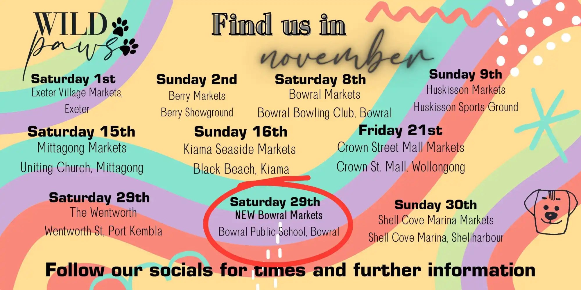 Pink heart-shaped dog plush toy with white paw prints and a blue collar.